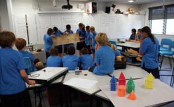 The project challenged students to devise ways to fund the photo of school children